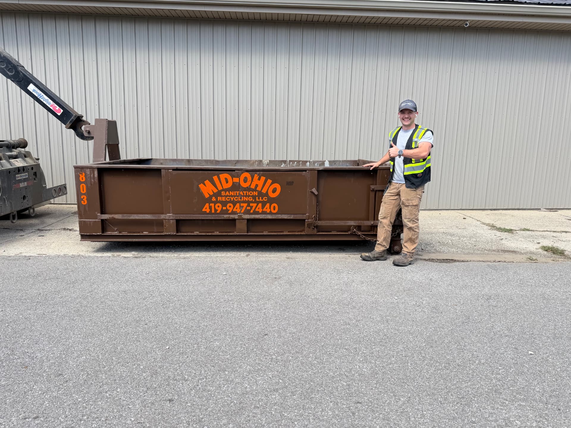 8 Yard Mid-Ohio Sanitation roll-off dumpster